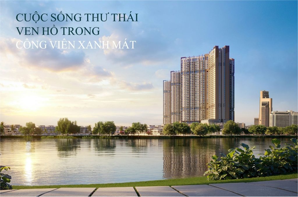 Galia Hanoi 2 Phối cảnh dự án Galia Hanoi với tòa nhà cao tầng hiện đại bên hồ nước lớn, xung quanh là công viên cây xanh và các dãy nhà thấp tầng, ánh sáng bình minh tạo nên khung cảnh yên bình và sang trọng.